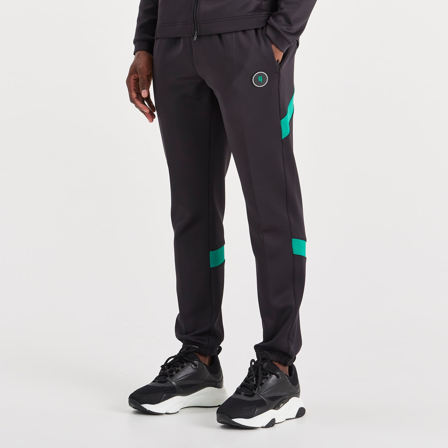 TEAM TRACKSUIT BOTTOMS BLACK/RACING GREEN