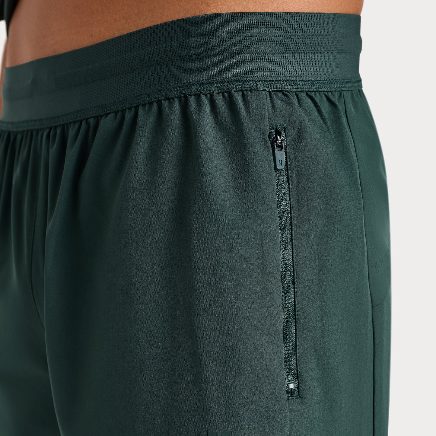 DARK GREEN PERFORMANCE SHORTS WITH INNER